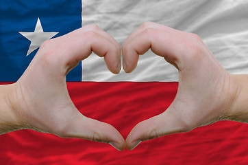 Image showing Heart and love gesture showed by hands over flag of chile backgr