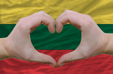 Image showing Heart and love gesture showed by hands over flag of lithuania ba