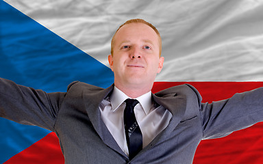 Image showing happy businessman because of profitable investment in czech stan