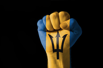 Image showing Fist painted in colors of barbados flag