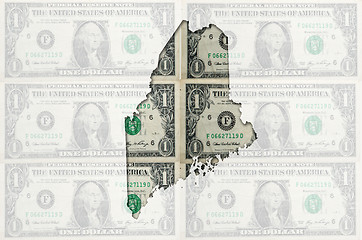 Image showing Outline map of maine with transparent american dollar banknotes 