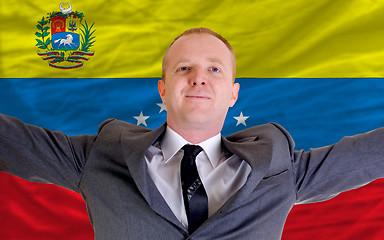 Image showing happy businessman because of profitable investment in venezuela 