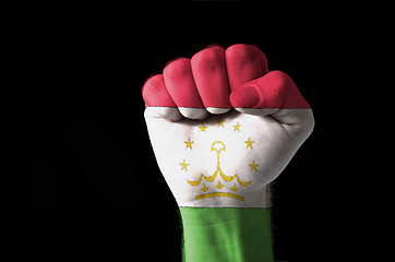 Image showing Fist painted in colors of tajikistan flag