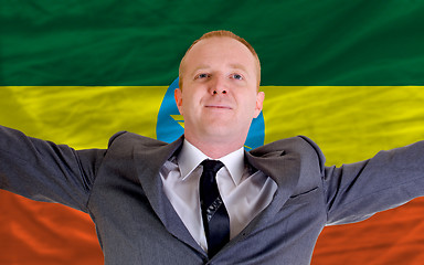 Image showing happy businessman because of profitable investment in ethiopia s