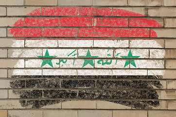 Image showing flag of Iraq on grunge brick wall painted with chalk  