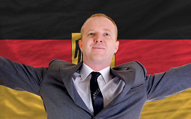 Image showing happy businessman because of profitable investment in germany st