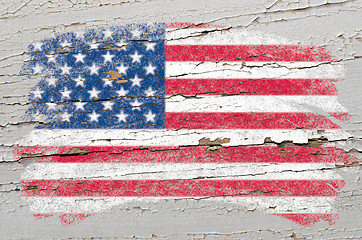 Image showing flag of USA on grunge wooden texture painted with chalk  