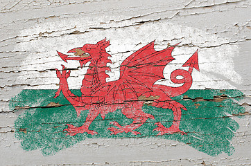 Image showing flag of wales on grunge wooden texture painted with chalk  