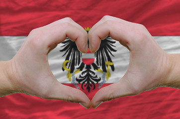 Image showing Heart and love gesture showed by hands over flag of Austria back