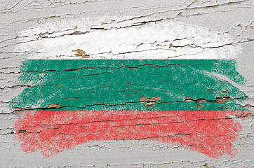 Image showing flag of Bulgaria on grunge wooden texture painted with chalk  