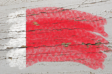 Image showing flag of bahrain on grunge wooden texture painted with chalk  