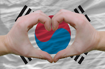Image showing Heart and love gesture showed by hands over flag of south korea 