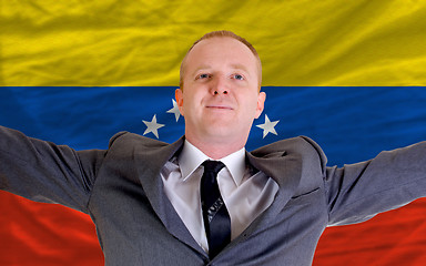 Image showing happy businessman because of profitable investment in venezuela 