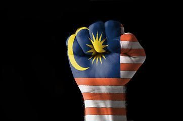 Image showing Fist painted in colors of malaysia flag