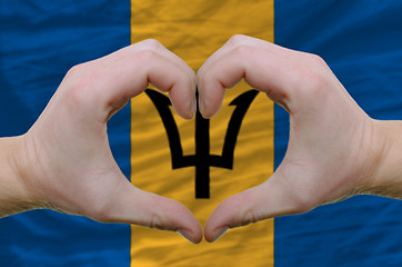 Image showing Heart and love gesture showed by hands over flag of barbados bac