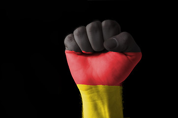 Image showing Fist painted in colors of germany flag