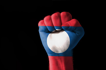 Image showing Fist painted in colors of laos flag