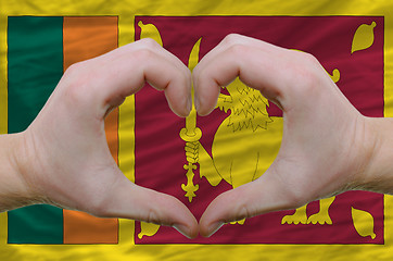 Image showing Heart and love gesture showed by hands over flag of sri lanka 