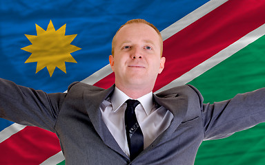 Image showing happy businessman because of profitable investment in namibia st