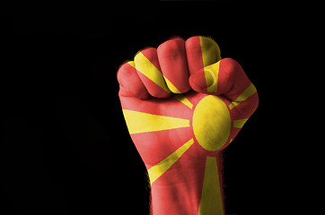 Image showing Fist painted in colors of macedonia flag