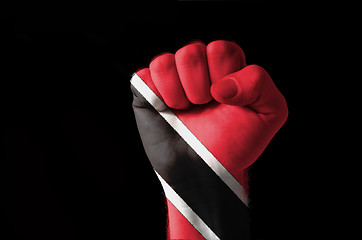 Image showing Fist painted in colors of trinidad tobago flag