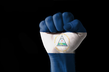 Image showing Fist painted in colors of nicaragua flag