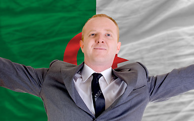 Image showing happy businessman because of profitable investment in algeria