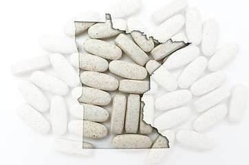 Image showing Outline map of minnesota with transparent pills in the backgroun