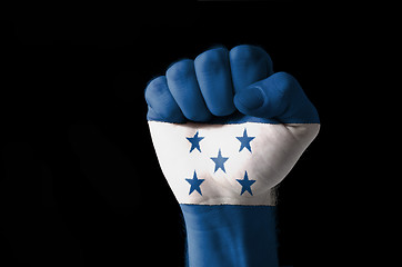 Image showing Fist painted in colors of honduras flag