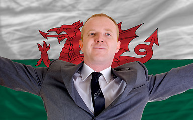 Image showing happy businessman because of profitable investment in wales stan