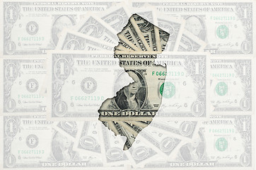 Image showing Outline map of new jersey with transparent american dollar bankn