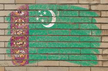 Image showing flag of turkmenistan on grunge brick wall painted with chalk  