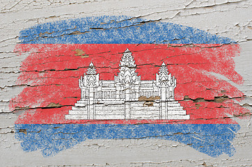 Image showing flag of cambodia on grunge wooden texture painted with chalk  