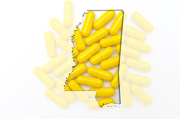 Image showing Outline map of mississippi with transparent pills in the backgro