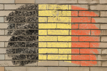 Image showing flag of Belgium on grunge brick wall painted with chalk  