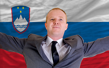 Image showing happy businessman because of profitable investment in slovenia s