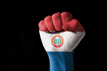 Image showing Fist painted in colors of paraguay flag