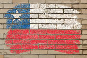 Image showing flag of chile on grunge brick wall painted with chalk  