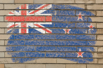 Image showing flag of New Zealand on grunge brick wall painted with chalk  