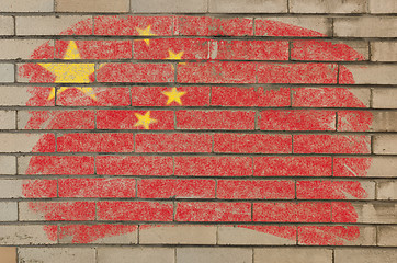 Image showing flag of China on grunge brick wall painted with chalk  