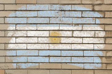 Image showing flag of Argentina on grunge brick wall painted with chalk  
