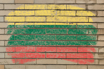 Image showing flag of lithuania on grunge brick wall painted with chalk  