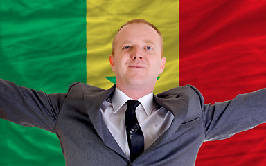 Image showing happy businessman because of profitable investment in senegal st