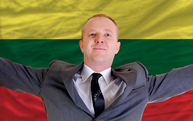 Image showing happy businessman because of profitable investment in lithuania 