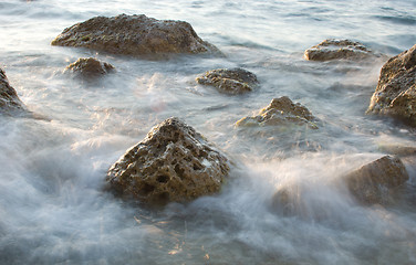 Image showing stones in sea water washing by waves