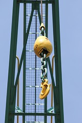 Image showing old yellow crane hook