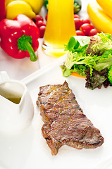 Image showing juicy BBQ grilled rib eye ,ribeye steak and vegetables