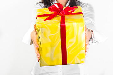 Image showing Giving a present this Christmas