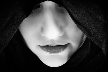 Image showing Woman with black hood, focus on her lips