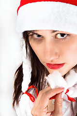 Image showing Girl in winter custome lokking